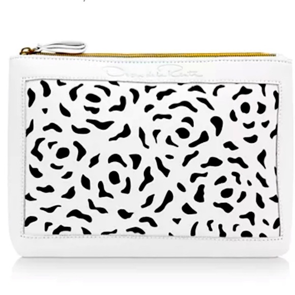 Oscar de la Renta Handbags - Oscar de la Renta pouch by Oscar de la renta parfum.